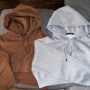 Naked Wardrobe cropped Hoodies